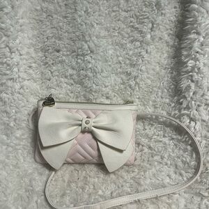 Betsey Johnson Pink quilted and White Bow crossbody bag.